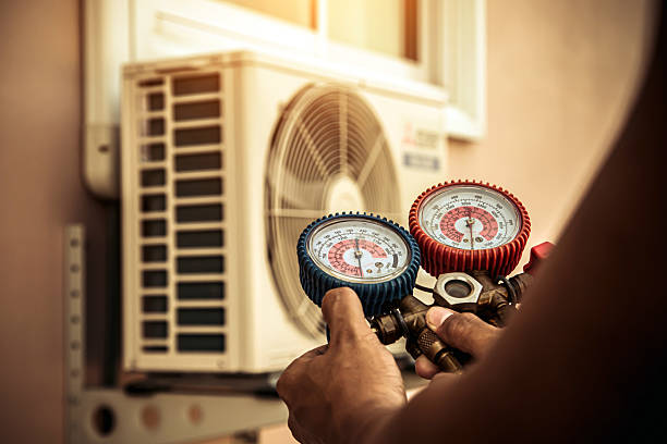 Professional Hvac Maintenance technician working in Rowley, MA